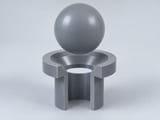 Conceptual CGI: Complete Rigid polyvinyl chloride; formulation and plasticiser restrictions defined sphere above a conical annular seat and an aligned open vertical bore; axial component contact concept