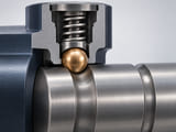Conceptual CGI: compact mechanical detent cutaway with phosphor-bronze sphere contacting a smooth steel groove