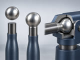 Conceptual CGI: industrial steel handle end with a silver sphere before and after a conceptual weld attachment; visible smooth joint but no sparks or people