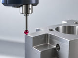 Conceptual CGI: Precision metrology stylus concept with one ruby-red sphere attached to a slim metal stem approaching a neutral machined reference block, no numeric readout or implied calibration