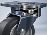 Conceptual CGI: open compact caster bearing race showing a single silver ball contacting two curved steel raceways