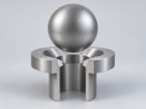 Conceptual CGI: Complete Specified commercially pure titanium or titanium alloy, including grade and condition sphere above a conical annular seat and an aligned open vertical bore; axial component contact concept