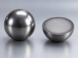 Conceptual CGI: Complete steel sphere and continuous solid hemispherical section with a thin conceptual hardened outer zone; no separate shell